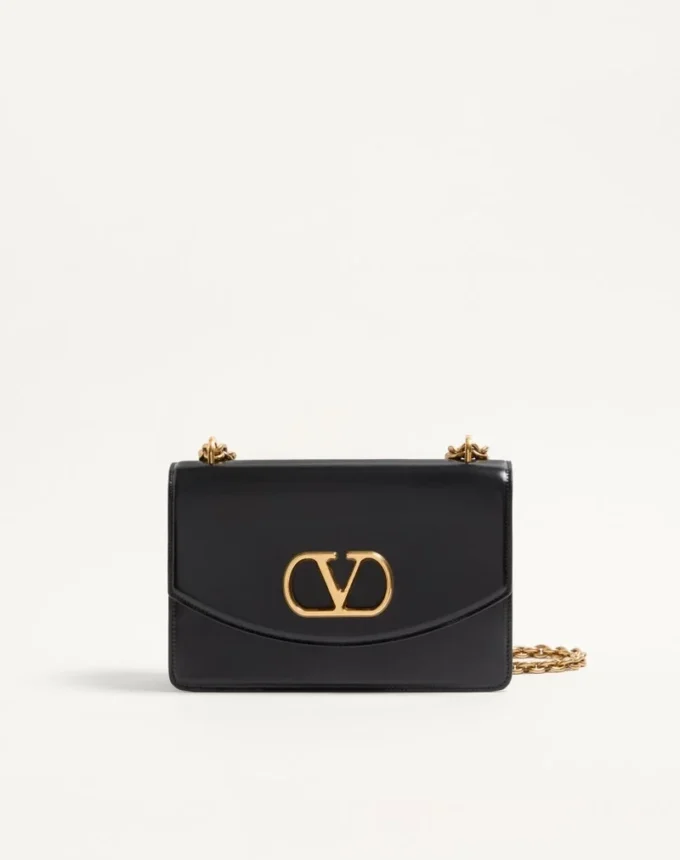 Valentino Garavani Vain Schultertasche aus glänzendem Kalbsleder Valentino Garavani Vain Schultertasche aus glänzendem Kalbsleder