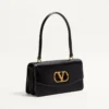 Valentino Garavani Vain Tasche mit Griff aus glänzendem Kalbsleder Valentino Garavani Vain Tasche mit Griff aus glänzendem Kalbsleder