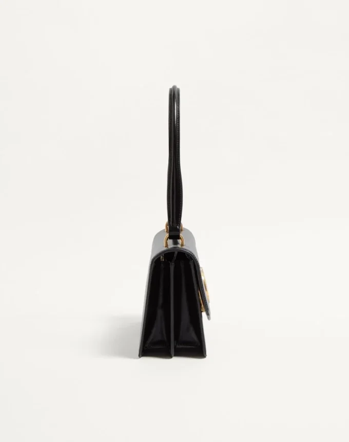 Valentino Garavani Vain Tasche mit Griff aus glänzendem Kalbsleder Valentino Garavani Vain Tasche mit Griff aus glänzendem Kalbsleder