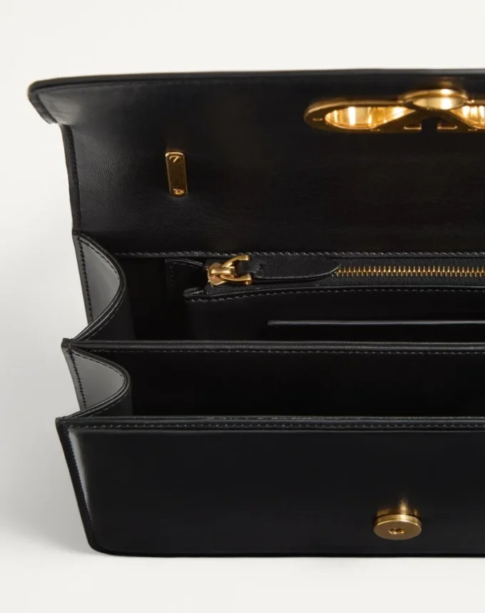 Valentino Garavani Vain Tasche mit Griff aus glänzendem Kalbsleder Valentino Garavani Vain Tasche mit Griff aus glänzendem Kalbsleder