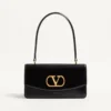 Valentino Garavani Vain Tasche mit Griff aus glänzendem Kalbsleder Valentino Garavani Vain Tasche mit Griff aus glänzendem Kalbsleder
