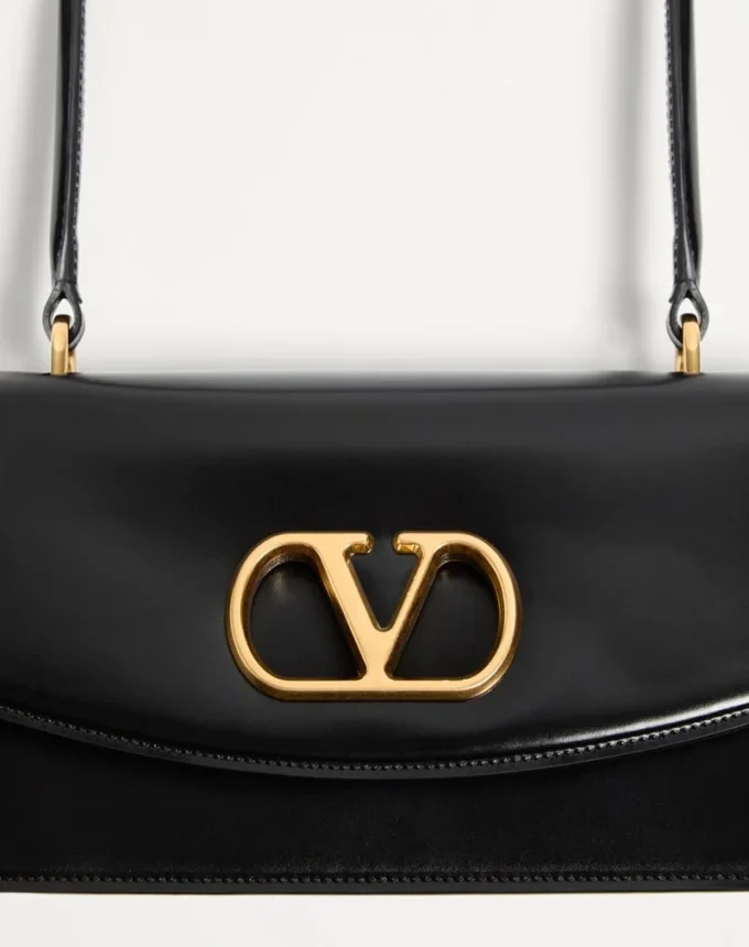 Valentino Garavani Vain Tasche mit Griff aus glänzendem Kalbsleder Valentino Garavani Vain Tasche mit Griff aus glänzendem Kalbsleder