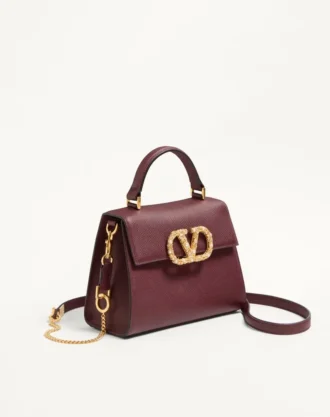 Valentino Garavani Vsling Kleine Handtasche aus genarbtem Kalbsleder mit Juwelenlogo