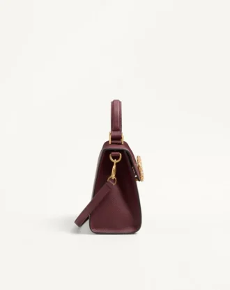 Valentino Garavani Vsling Kleine Handtasche aus genarbtem Kalbsleder mit Juwelenlogo
