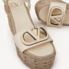 Vlogo Kalbsleder-Sandalette mit Cut-Out-Design und 110 mm Keilabsatz Vlogo Kalbsleder-Sandalette mit Cut-Out-Design und 110 mm Keilabsatz