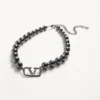 Vlogo Signature Metall-Halsband mit Swarovski®-Perlen Vlogo Signature Metall-Halsband mit Swarovski®-Perlen