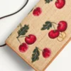 Vlogo Signature Mini-Umhängetasche aus Jacquard-Raffia mit Cherryfic-Muster Vlogo Signature Mini-Umhängetasche aus Jacquard-Raffia mit Cherryfic-Muster