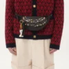 Wollcardigan mit Tout La V-Muster Wollcardigan mit Tout La V-Muster