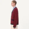 Wollcardigan mit Tout La V-Muster Wollcardigan mit Tout La V-Muster