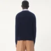 Wollpullover mit Rundhalsausschnitt und Chez Valentino-Stickerei Wollpullover mit Rundhalsausschnitt und Chez Valentino-Stickerei