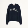 Wollpullover mit Rundhalsausschnitt und Chez Valentino-Stickerei Wollpullover mit Rundhalsausschnitt und Chez Valentino-Stickerei